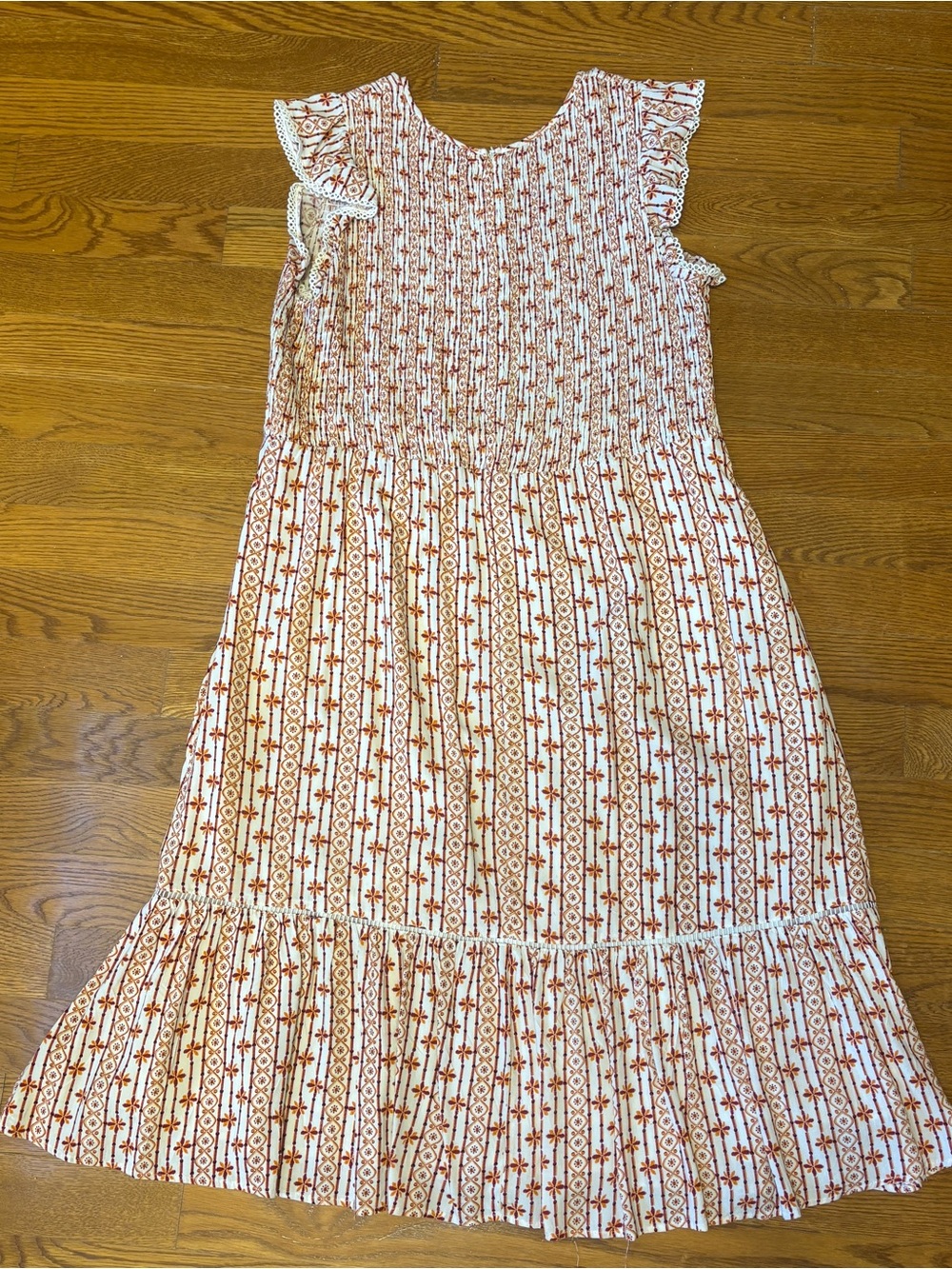 Lost + Wander Smocked Cream Dress with Rust and Orange design